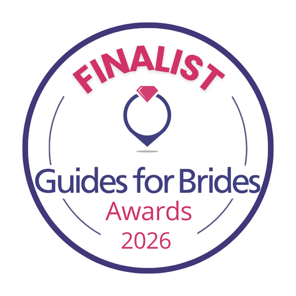 Round badge reading "FINALIST Guides for Brides Awards 2026" with a pink diamond icon above the text. Wedding Photo taken by Jennings Photography