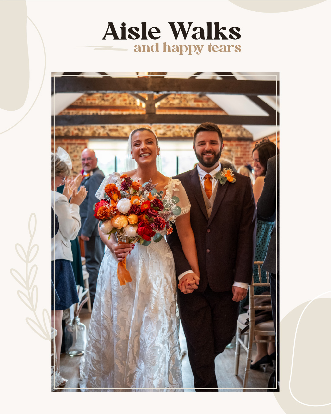 A bride and groom walk down the aisle smiling, hand in hand, as guests clap. The bride holds a bouquet of vibrant flowers. Wedding Photo taken by Jennings Photography